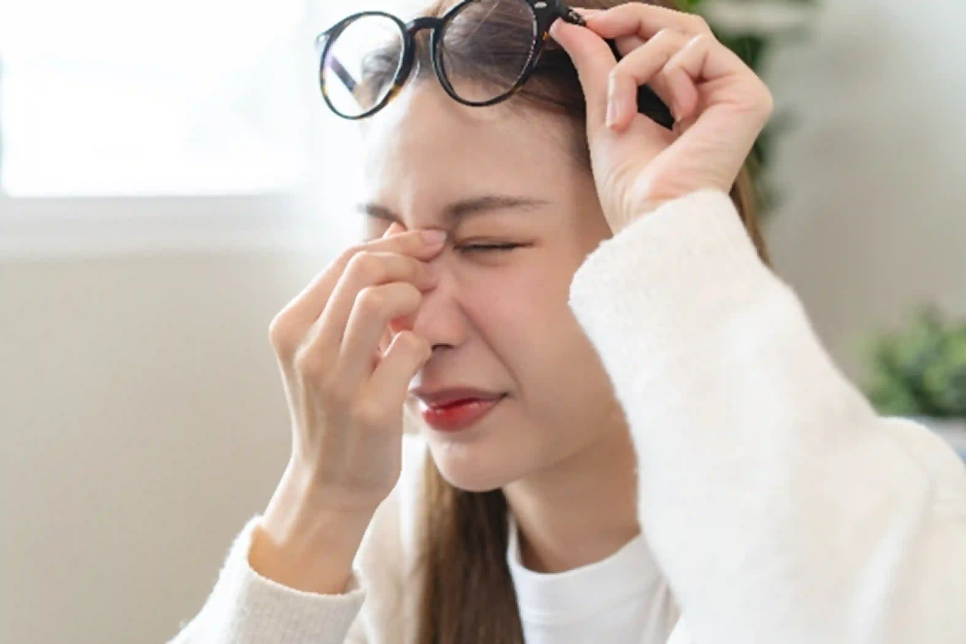 Womam with strained Eyes